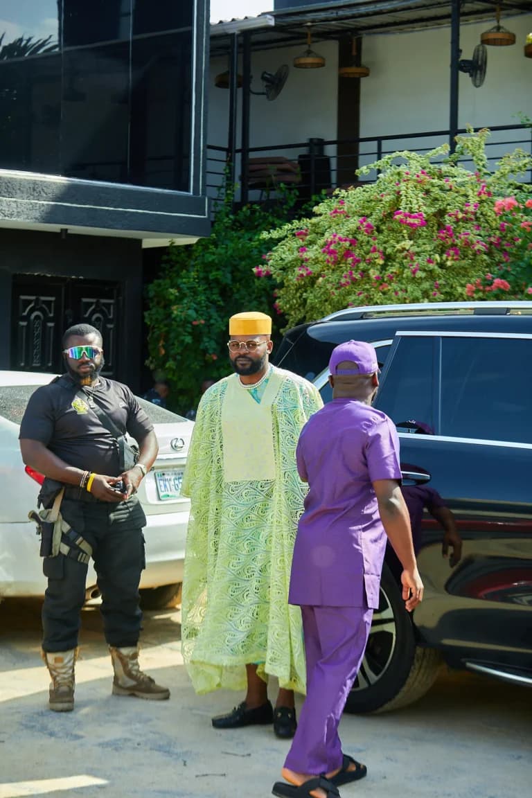 Guests arriving in colourful outfits for the community hangout