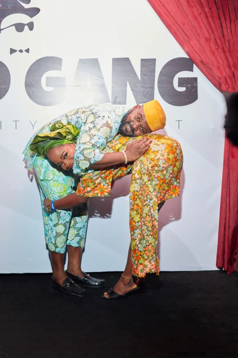 Falz greeting a guest at the event photo backdrop