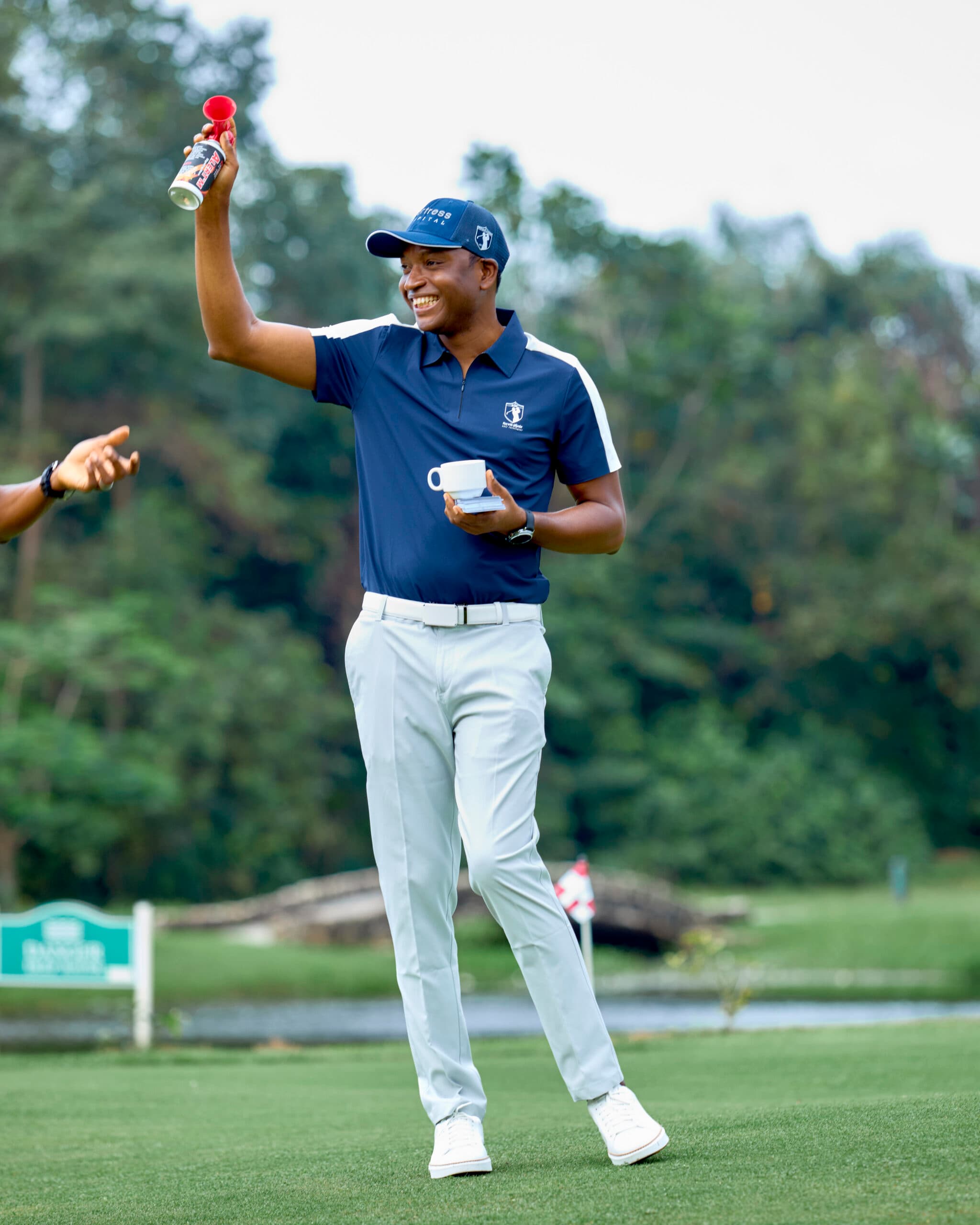 A player enjoying a moment during the golf tournament
