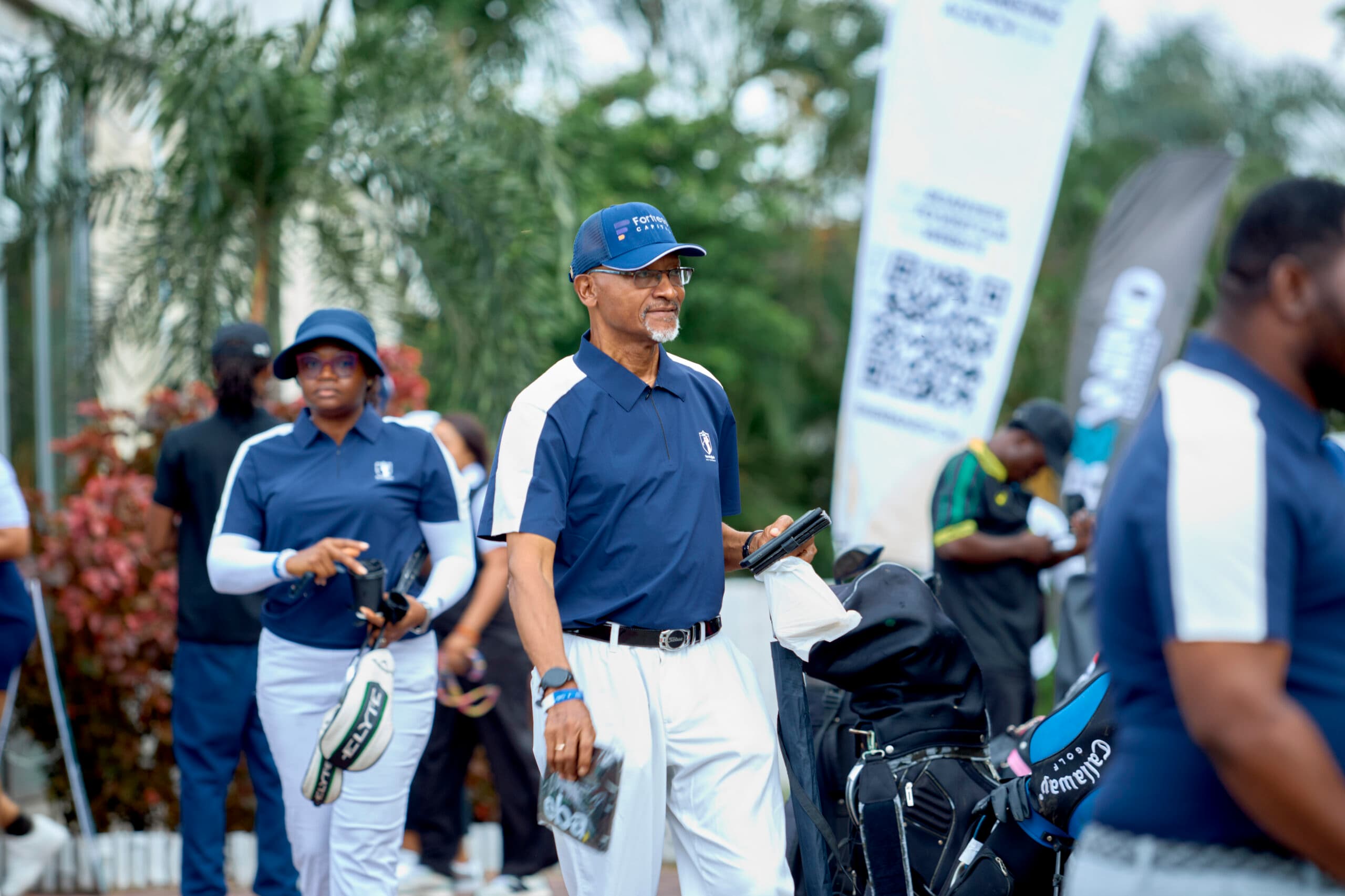 Golfers walking the course together