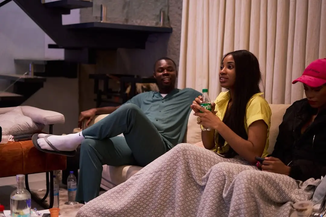 Guests sharing a relaxed conversation at The Eniivy Experience